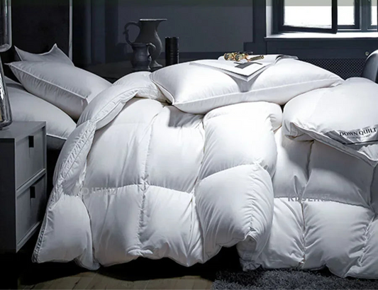 Couette en Duvet d’Oie Blanche – Luxe et Confort pour Toutes les Saisons